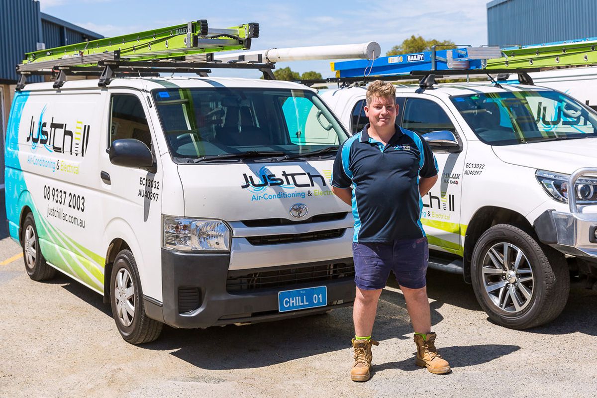 Brad with a Just Chill service van, prepared for air con installations.